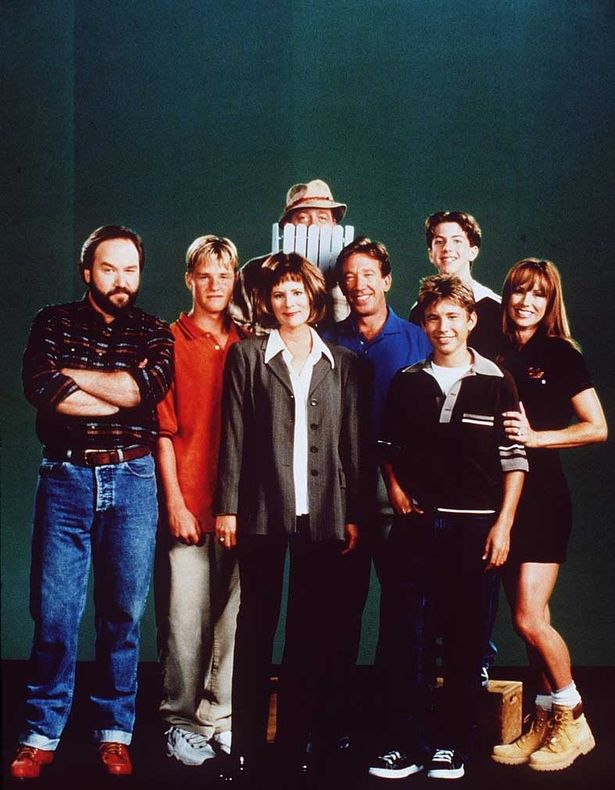 The cast of Home Improvement. Back: Earl Hindman and Taran Smith. Front from L-R: Richard Karn, Zachary Ty Bryan, Patricia Richardson, Tim Allen, Jonathan Taylor Thomas and Debbe Dunning.